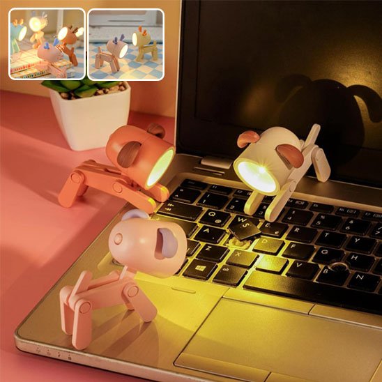 Trois lampes de bureau en forme de chien, une orange, une beige aux oreilles oranges et la derniÚre est rose avec les oreilles lilas. Elles jouent sur un ordinateur portable. Deux encarts présentent les lampes dans des décors différents, dont une avec quatre lampes montés sur des livres et l'autre avec deux lampes sur une table carrelée.