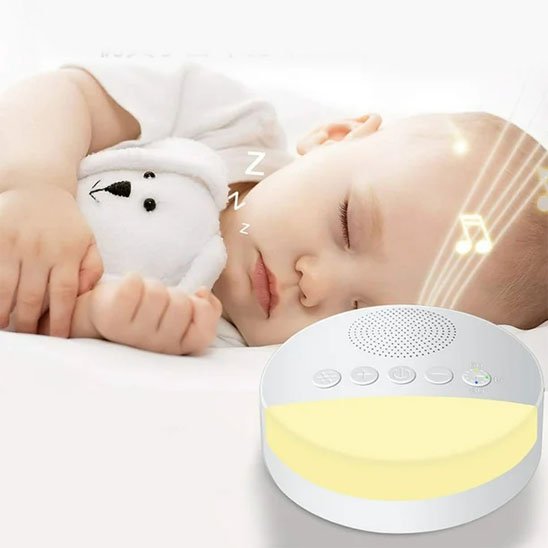 Un bébé dort au son de la veilleuse bruit blanc | DreamSleep qui émet un douce lumière