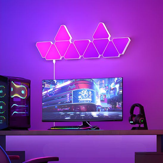 On voit 11 appliques murales interieur | Design Reuleaux installées au mur d'un espace bureau qui illuminent la pièce dans un dégradé de couleurs qui sont du rose au mauve
